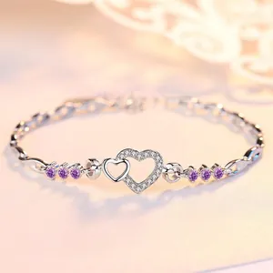 Elegant S925 silver heart-to-heart bracelet with purple crystals and pavé diamonds
