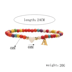 Bracelet de cheville perlé avec lettre A, affichant longueur de 24cm et dimensions.