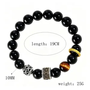 Detail of 10mm obsidian mantra bracelet with tiger eye bead, 19cm length, 25g weight