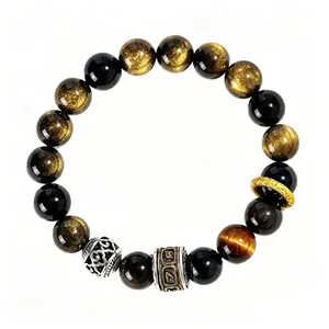 Close-up of 10mm golden sheen obsidian bracelet with mantra barrel and tiger's eye