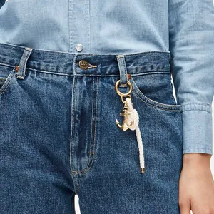 Ciondolo per borsa ancora dorata vintage con nappa in corda bianca per accessori