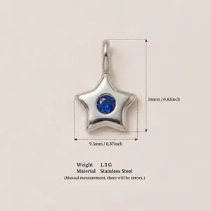 Detail view of silver star pendant with blue gem showing 16mm height and 9.5mm width.