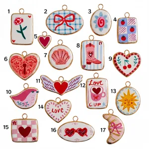 Detailed view of seventeen colorful hand-painted stainless steel pendants with gold trim