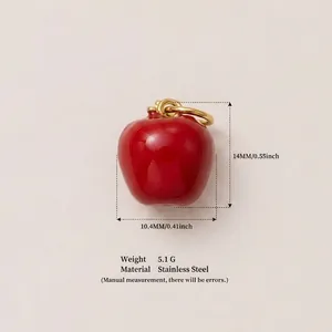 Detailed view of a red apple pendant accessory with stainless steel material and dimensions