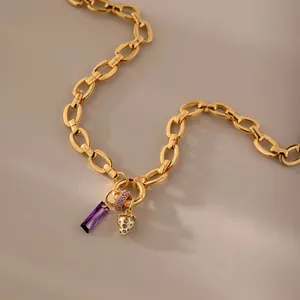 Elegant gold titanium steel chain necklace featuring purple crystal and strawberry charms
