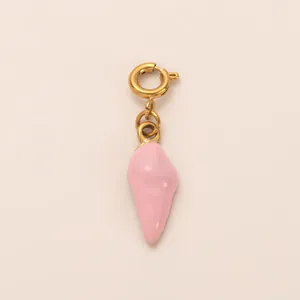 Close-up of a pink enamel shell-shaped pendant charm with gold-colored spring ring clasp