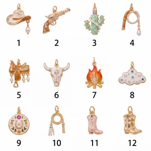Detailed view of 12 Western cowboy gold charms with enamel and pearl accents