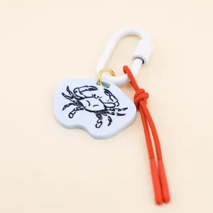 Summer ocean style hand-drawn crab pendant charm with white carabiner and red cord