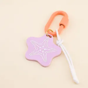 Summer ocean style purple starfish pendant keychain with orange carabiner DIY accessory.