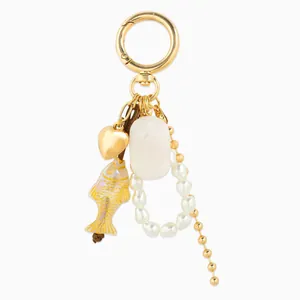 Elegant niche luxury koi fish and pearl bag charm keychain with a golden heart