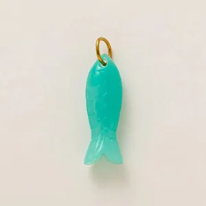 Detailed view of a translucent green fish charm with scale texture and gold-plated ring