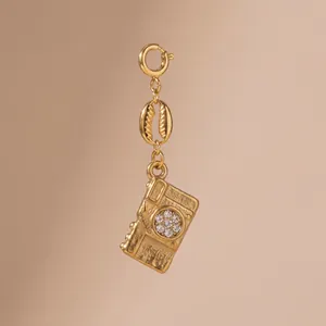 Detailed vintage gold-tone camera charm pendant with sparkling rhinestones for DIY jewelry