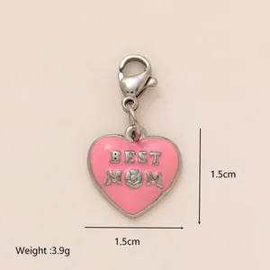 Pink heart-shaped stainless steel pendant 'Best Mom' with measurements 1.5cm and 3.9g weight.