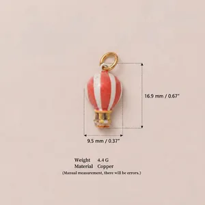 Macro view of red striped hot air balloon copper pendant with product measurements
