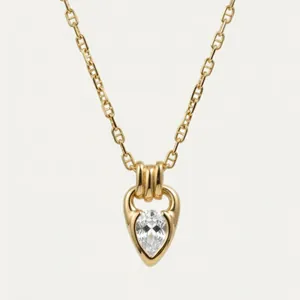 Detail shot of a teardrop-shaped clear zircon pendant on an 18K gold-plated cable chain