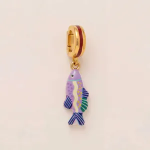Detailed view of a colorful enamel fish charm with a gold-tone hoop for DIY jewelry.