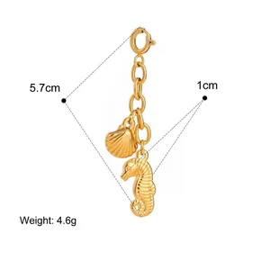 Detailed view of 18K gold plated seahorse and shell pendant with dimensions and weight.