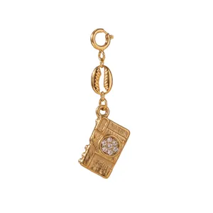 Vintage style gold camera pendant featuring sparkling rhinestones and a unique shell link