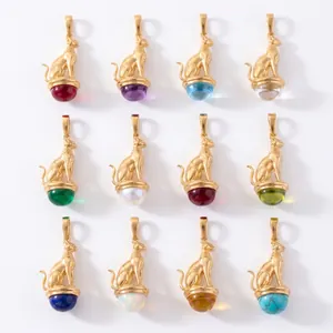 Collection of gold-plated Egyptian Bastet cat pendants with colorful gemstones.
