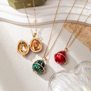 Collier Pendentif Œuf de Pâques Style Fabergé Ouvert avec Émail Strass Casse-Noisette Oiseau Cheval Bijoux en Cuivre