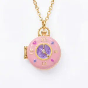 Detailed view of a pink doughnut-shaped locket necklace with gold Roman numerals