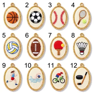 Collection of 12 embroidered sports pendants featuring soccer, basketball, and baseball designs