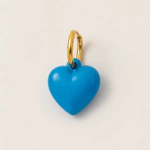 Elegant gold hoop earring featuring a vibrant blue 3D heart-shaped pendant accessory