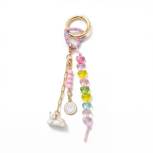 Detailed view of a colorful DIY keychain with heart beads and charming small pendants