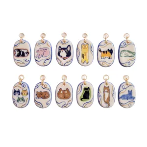 12er Set süße Katzen-Keramik-Anhänger mit verschiedenen Illustrationen für DIY-Schmuck