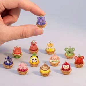 Various miniature fruit animal tart charms featuring cute panda bear and bunny designs