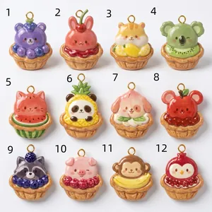 Detailed showcase of twelve assorted fruit animal pendants in a numbered grid layout