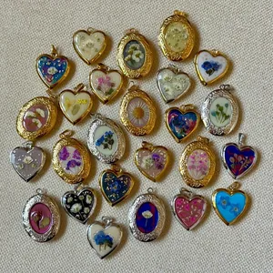 Vintage pressed flower locket pendants in heart and oval shapes with gold and silver frames