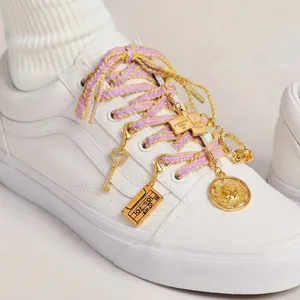 Set of vintage lucky element shoe charms featuring love letter and key pendants
