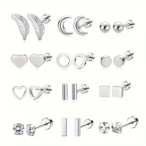 Collection of diverse stainless steel stud earrings featuring feather, moon, and geometric heart shapes