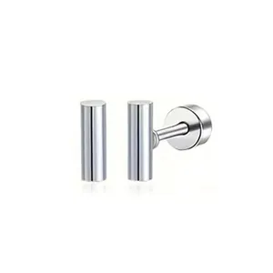 Close-up detail of minimalist stainless steel cylindrical T-bar screw back stud earrings