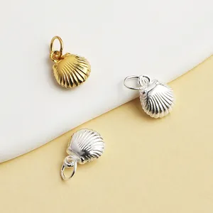 Vue détaillée de pendentifs coquillages en argent S990 or et argent pour bijoux DIY