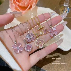 Pendentifs trèfle et cerise en zircon rose sur diverses chaînes en or et en argent
