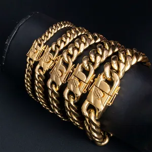 Detail of hip-hop stainless steel Cuban link chains in various widths and gold finish