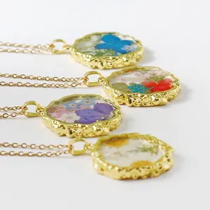 Elegant handmade dried flower resin necklaces with irregular gold pendants in four colors