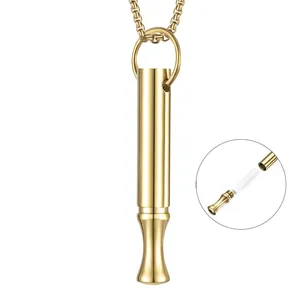 Collier sifflet de décompression en acier titane doré avec détail du filtre