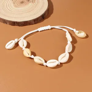 Bracciale in conchiglie intrecciato a mano per donna stile vacanza al mare ed oceano
