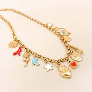 Detailed view of 18K gold plated DIY charm necklace with colorful enamel hearts and star