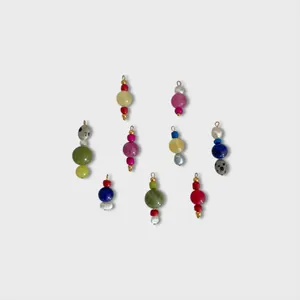 Detailed assortment of colorful dopamine beaded charms with baroque pearls and 18k gold plating