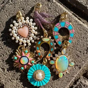 Collection of colorful dopamine pendants with horseshoe and opal elements