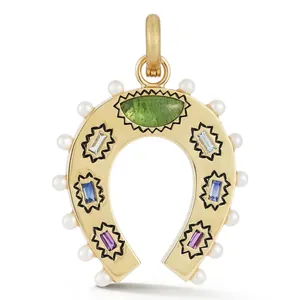 Close-up of colorful horseshoe pendant with pearls and multi-colored birthstones
