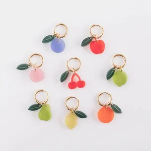 Detailed view of colorful fruit-shaped stainless steel charms for DIY jewelry making.