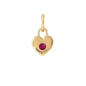 Close-up of 18K gold-plated stainless steel heart pendant with red crystal stone