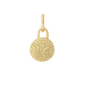 Detailed view of a gold-plated stainless steel round pendant with pavé-set stones.