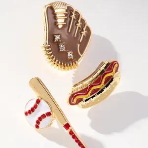 Close-up of vibrant baseball glove, hot dog, and baseball bat charms with rhinestones