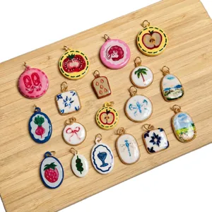Assorted colorful summer themed charms with fruit and flower prints for DIY